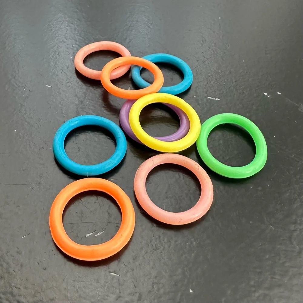Colourful resin & rubber ring bundle - 17 unique pieces